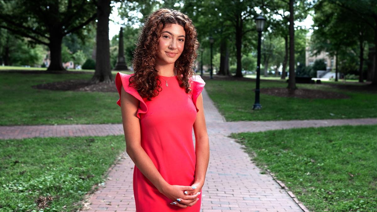 Portrait of Carolina first-year student Tazanna Jones on McCorkle Place on the University's campus.